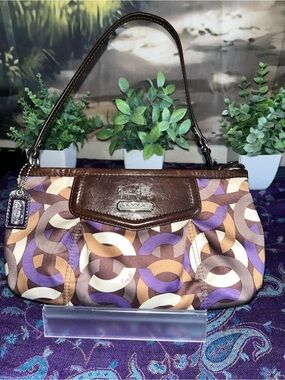 Coach “C” print large wristlet